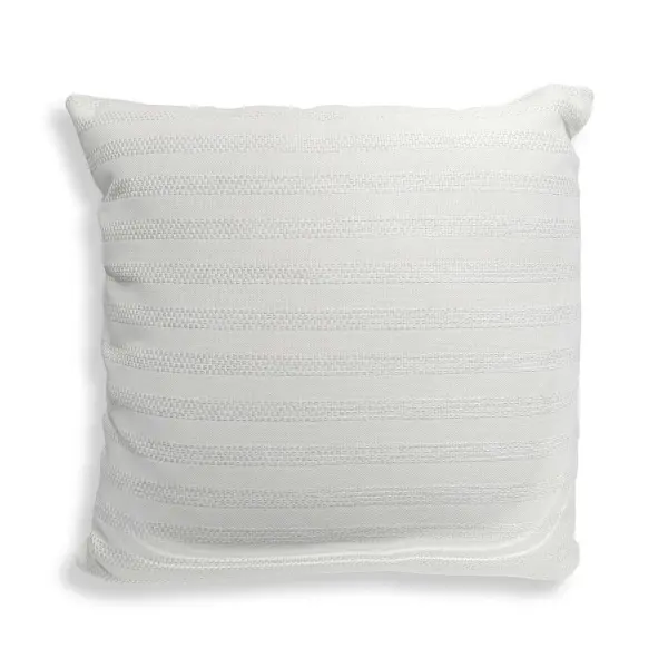 A soft-toned ivory accent pillow in durable Sunbrella acrylic with a plush polyester fill, built to handle both indoor and outdoor settings.