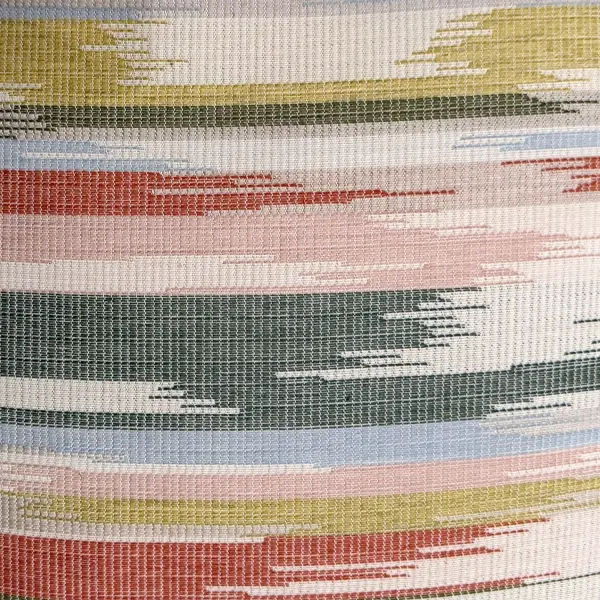 This Sunbrella acrylic pillow brings a whimsical flame-stitch pattern in coral, sky blue, and yellow tones, with a water-resistant casing and plush polyester fill for durable outdoor comfort.