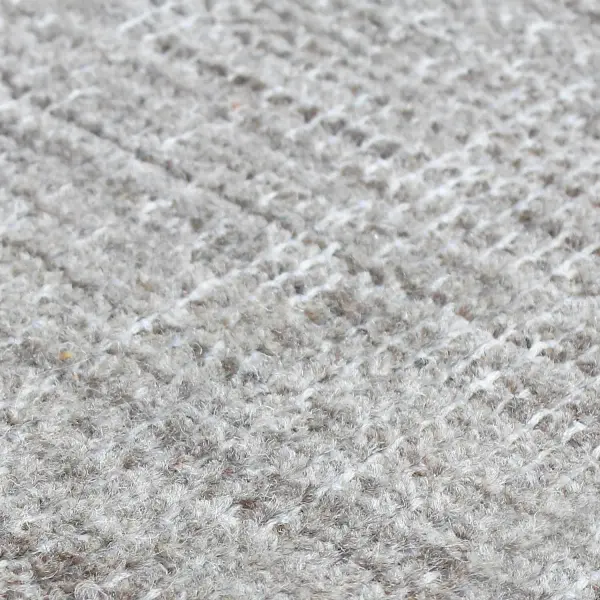 Hand-woven gray wool with a distressed, vintage-inspired look. A versatile foundation piece for living rooms, bedrooms, and offices.