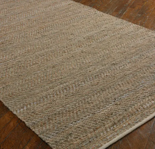 A 5x8 rug made from rescued Italian leather hand woven with natural hemp, delivering an earthy, textured look for low-traffic spaces.