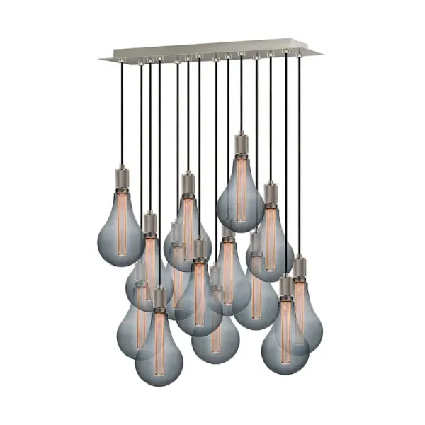 The Crosshatch Rectangular Chandelier brings contemporary sophistication with its geometric pattern and clean lines. Perfect for dining rooms and kitchen islands, this linear fixture offers versatile styling in satin nickel or bronze finishes.