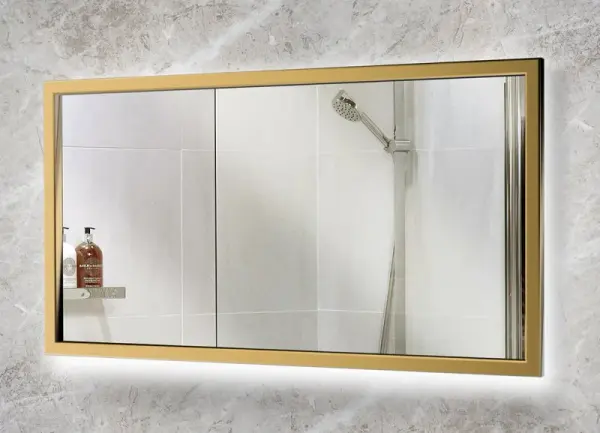 This 48x24 rectangular LED mirror combines functional illumination with sophisticated style. The brushed brass finish adds warmth while the integrated LED backlighting provides even, flattering light perfect for grooming tasks.