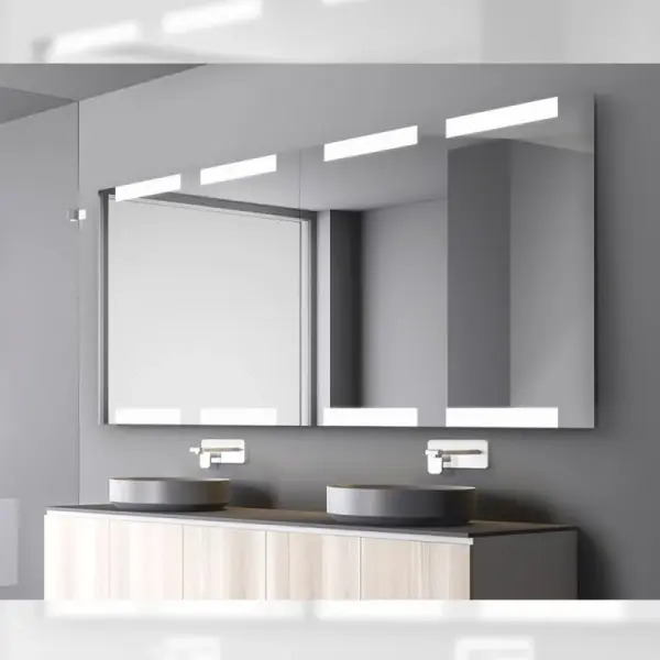 This 48" x 60" rectangular LED mirror delivers professional-grade illumination with 1200 lumens and 90 CRI for accurate color rendering. IP44-rated for bathroom safety with energy-efficient 3000K warm white lighting.