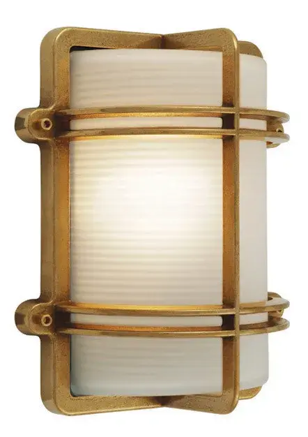 The Oceano outdoor wall sconce brings contemporary coastal style to exterior spaces with its compact 10-inch profile. Ideal for flanking doorways or illuminating outdoor living areas with modern flair.