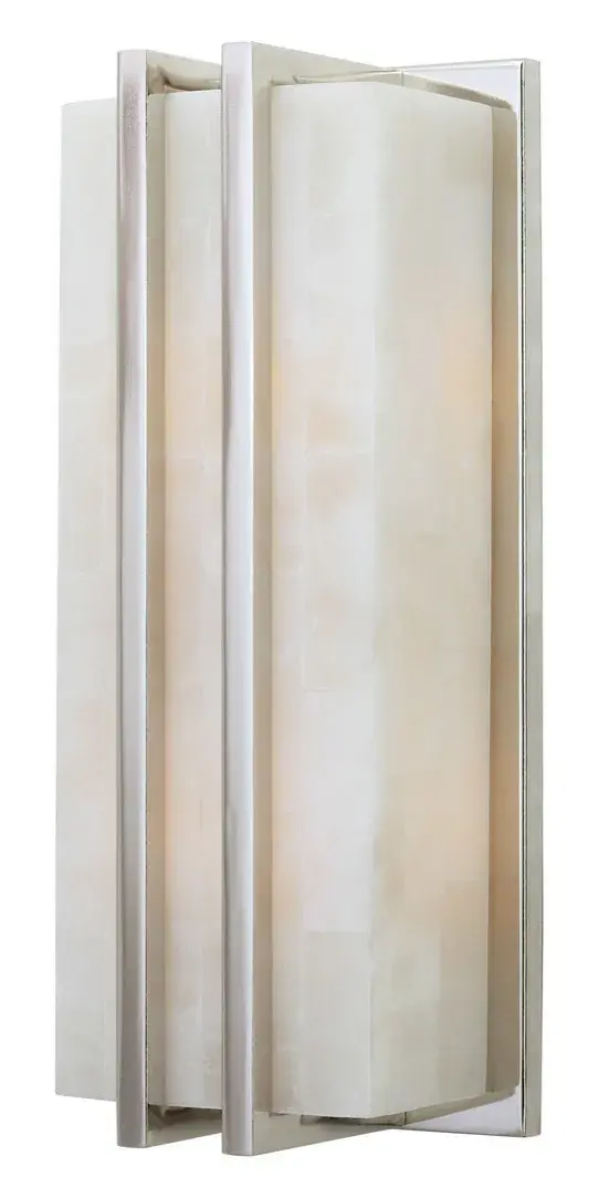 The Vida wall sconce delivers modern sophistication with its clean lines and matte black finish. Compact at 10.25" height, it provides dual-light functionality perfect for flanking mirrors or illuminating hallways.