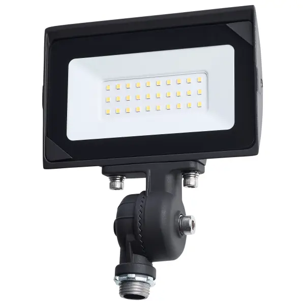 The SATCO NUVO LED Flood Light series delivers reliable, high-output illumination for outdoor area and site lighting applications in a cost-effective design. Constructed with a durable die-cast aluminum housing and a tempered glass lens, these fixtures are built to perform in demanding environments and are wet location rated with an IP65 classification. A wide 120-degree beam angle and NEMA 6Vx6H distribution provide broad, even light coverage. Offered in multiple wattage and lumen packages, these flood lights achieve up to 115 lumens per watt for efficient operation. Available CCT options include 4000K and 5000K to suit a range of exterior lighting needs. Additional features include an IK06 impact rating and a bronze finish. With a 30,000-hour rated life and a 3-year warranty, this series offers dependable performance and long-term value.