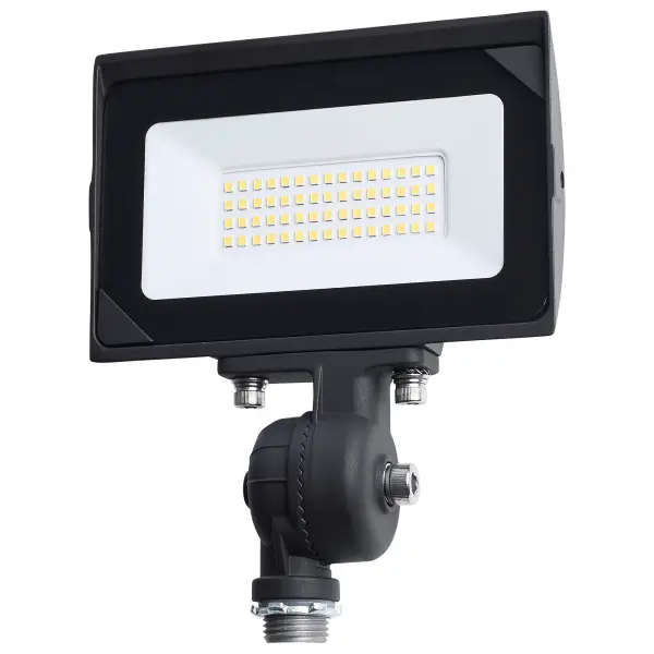 The SATCO NUVO LED Flood Light series delivers reliable, high-output illumination for outdoor area and site lighting applications in a cost-effective design. Constructed with a durable die-cast aluminum housing and a tempered glass lens, these fixtures are built to perform in demanding environments and are wet location rated with an IP65 classification. A wide 120-degree beam angle and NEMA 6Vx6H distribution provide broad, even light coverage. Offered in multiple wattage and lumen packages, these flood lights achieve up to 115 lumens per watt for efficient operation. Available CCT options include 4000K and 5000K to suit a range of exterior lighting needs. Additional features include an IK06 impact rating and a bronze finish. With a 30,000-hour rated life and a 3-year warranty, this series offers dependable performance and long-term value.