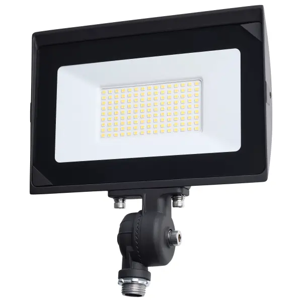 The SATCO NUVO LED Flood Light series delivers reliable, high-output illumination for outdoor area and site lighting applications in a cost-effective design. Constructed with a durable die-cast aluminum housing and a tempered glass lens, these fixtures are built to perform in demanding environments and are wet location rated with an IP65 classification. A wide 120-degree beam angle and NEMA 6Vx6H distribution provide broad, even light coverage. Offered in multiple wattage and lumen packages, these flood lights achieve up to 115 lumens per watt for efficient operation. Available CCT options include 4000K and 5000K to suit a range of exterior lighting needs. Additional features include an IK06 impact rating and a bronze finish. With a 30,000-hour rated life and a 3-year warranty, this series offers dependable performance and long-term value.