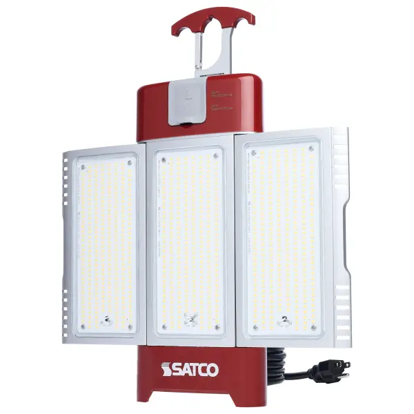 SATCO NUVO's Multi-Beam Temporary Work Light offers powerful, flexible illumination in a sleek new design. This 120V fixture features selectable wattages from 30W to 120W, producing up to 19,820 lumens at 5000K. Dual light panels expand from 10 to 360 degrees, with adjustable beam angles of 180, 280, or 360 degrees to direct light where needed. It includes a 10-foot power cord and integrated outlet for linking up to eight fixtures. A removable T-handle allows quick accessory changes, and a safety cable mounting kit is included for secure installation. The remote control offers on/off and dimming functionality. Built from durable plastic and aluminum with a clear polycarbonate lens and high-visibility gloss red finish, this fixture supports multiple setup configurations for maximum versatility. - alternate view