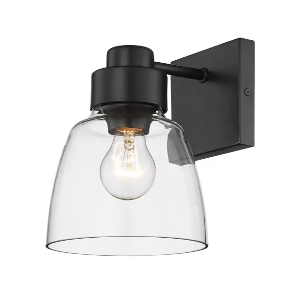 The Golden Lighting Remy wall sconce combines contemporary elegance with timeless appeal. Its clear glass shade and matte black frame create sophisticated illumination perfect for hallways, bedrooms, and dining areas.