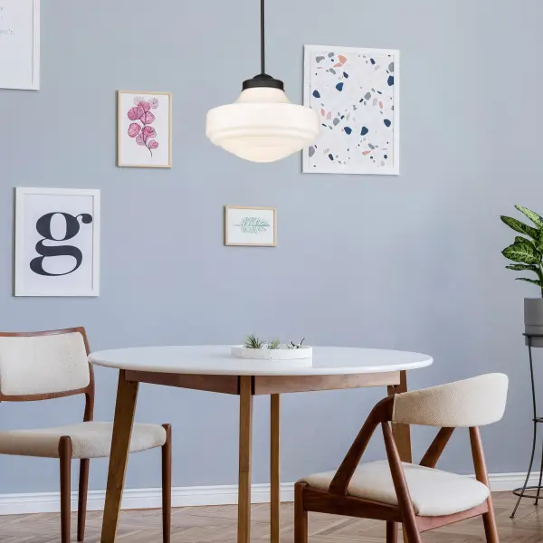 The Ingalls pendant combines timeless farmhouse style with practical versatility. Its vintage milk glass shade produces a soft, glare-free glow while the matte black finish adds sophisticated contrast to any space. - alternate view