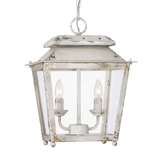 The Abingdon pendant brings artisan-crafted charm with its distressed antique ivory finish and clear glass shade. Perfect for adding vintage warmth to kitchens and dining spaces with adjustable height for various ceiling configurations.