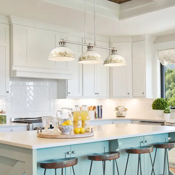The Kinsley 3-Light Island Light combines aged galvanized steel with antique ivory metal shades to create a statement piece that evokes European heirloom charm. Perfect for farmhouse and traditional kitchens seeking character-rich lighting. - alternate view