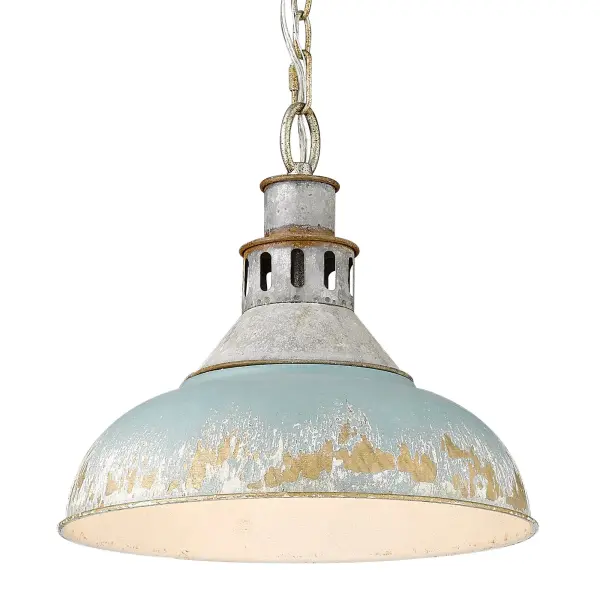The Kinsley pendant brings artisanal farmhouse character with its heavily distressed antique teal shade revealing gold and white undertones. The aged galvanized steel frame adds industrial sophistication while remaining versatile enough for coastal and rustic interiors.