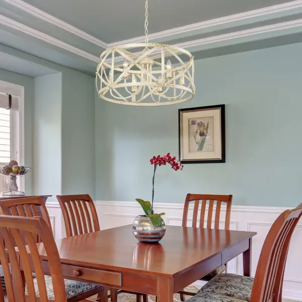 The Alcott 6-light chandelier combines classic farmhouse charm with sophisticated vintage appeal. Its distinctive Antique Ivory finish features intentional crackling that reveals gilded underlays, creating an heirloom-quality aesthetic perfect for traditional and transitional spaces. - alternate view