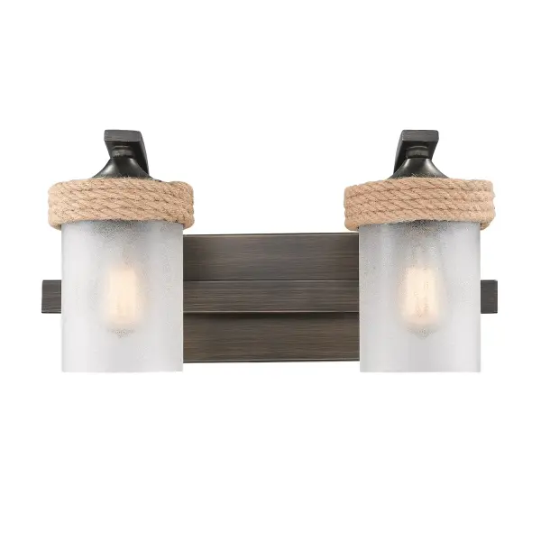 Bring coastal elegance into your home with the Wry Lighting Chatham 3-light Vanity in Gunmetal Bronze. Featuring a glass shade and a chic gunmetal bronze frame, it creates a captivating atmosphere. The clear sandblasted glass shade provides a lovely frosty white appearance, diffusing light to create a calming ambiance. The rich gunmetal bronze finish blends the warmth of bronze with cool gray overtones for a textural depth that enriches your decor. It is damp location rated, making it suitable for bathrooms and covered porches. Requires 3 E26 Medium base bulbs (not included), max wattage 100 per bulb. Dimensions are 22.75"W x 7.75"H x 7.88"D, combining style and functionality. This lighting fixture is the perfect touch for your coastal-themed space. - alternate view