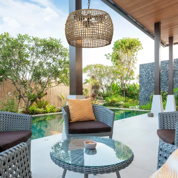 The Piper 3-Light Outdoor Pendant combines natural wicker warmth with a wet-rated design, perfect for covered and uncovered outdoor spaces. Its convertible mounting and boho aesthetic make it versatile for patios, porches, and entryways. - alternate view