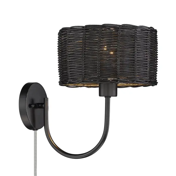The Erma wall sconce brings organic texture and coastal charm to any space with its handwoven black wicker shade and matte black frame. The convenient plug-in design eliminates hardwiring, making it perfect for renters or easy room updates.