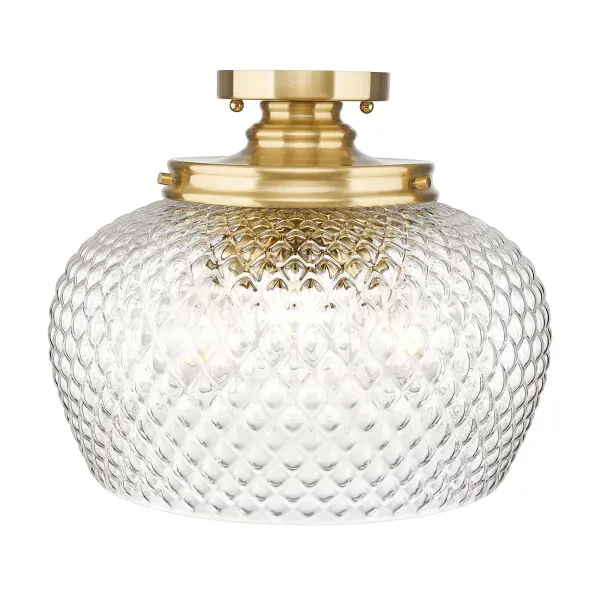 The Adeline 3-light semi-flush mount beautifully blends farmhouse charm with contemporary appeal. Its clear glass shade and modern brushed gold finish create a warm, inviting atmosphere perfect for mid-height ceilings.