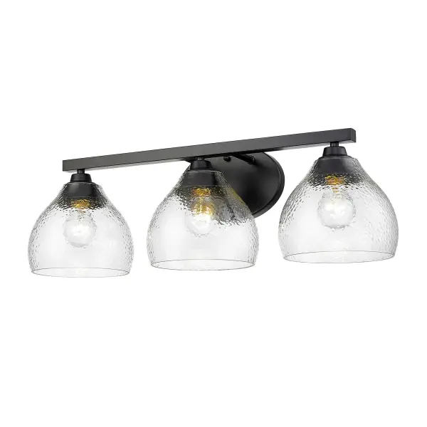 The Ariella 3-light vanity combines transitional elegance with practical functionality. Its hammered glass shades create a sparkling light effect while the matte black finish offers timeless versatility across decor styles.