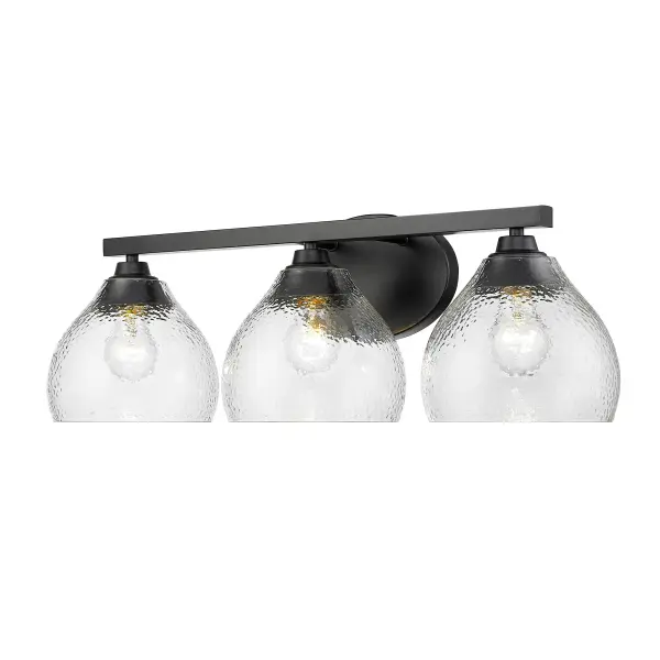 The Ariella 3-light vanity combines transitional elegance with practical functionality. Its hammered glass shades create a sparkling light effect while the matte black finish offers timeless versatility across decor styles. - alternate view