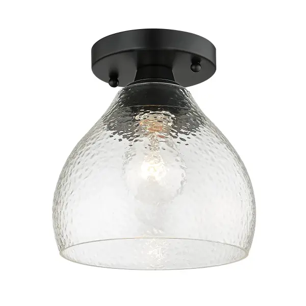 The Ariella semi-flush mount combines a sleek matte black frame with hammered clear glass for dynamic light play. Its compact 7.38" profile suits mid-height ceilings while the damp location rating adds versatility. - alternate view