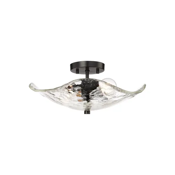 Bring nature-inspired elegance into your home with the Golden Lighting Samara 2-light Semi-Flush Mount. Featuring a glass shade and a Matte Black frame, it creates a welcoming atmosphere. The hammered water glass shade showcases a stunning texture with a glossy finish, designed to refract light beautifully, resulting in a dynamic glow that adds organic charm. Its Matte Black finish is timeless and perfectly smooth to the touch, effortlessly complementing various décors. Ideal for entryways, bedrooms, kitchens, and living areas with mid-height ceilings, this fixture is damp location rated, making it suitable for covered and semi-enclosed spaces with occasional moisture. Overall Dimensions: 15.38"W x 6.63"H x 13.25"D. Requires 2 E26 Medium base bulbs (not included), with a maximum wattage of 60 per bulb. Elevate your space with the artisanal quality and beauty of this unique fixture, designed for those who appreciate the finer details. Collection: Samara Finish: Matte Black Glass: Hammered Water Glass Width: 15.38" Height: 6.63" Length: 13.25" Weight: 7.00 lb Extension from Wall: 13.25" Canopy: 4.75"W x 4.75"H x 0.75"D Number of Bulbs: 2 Maximum Wattage: 120.00 W Bulb Type: A19 Bulb Base: E26 Light Source: Incandescent Dimmable Voltage: 120.00 V Country of Origin: China Safety Listing: ETL Manufacturer Warranty: 1 Year Limited - alternate view