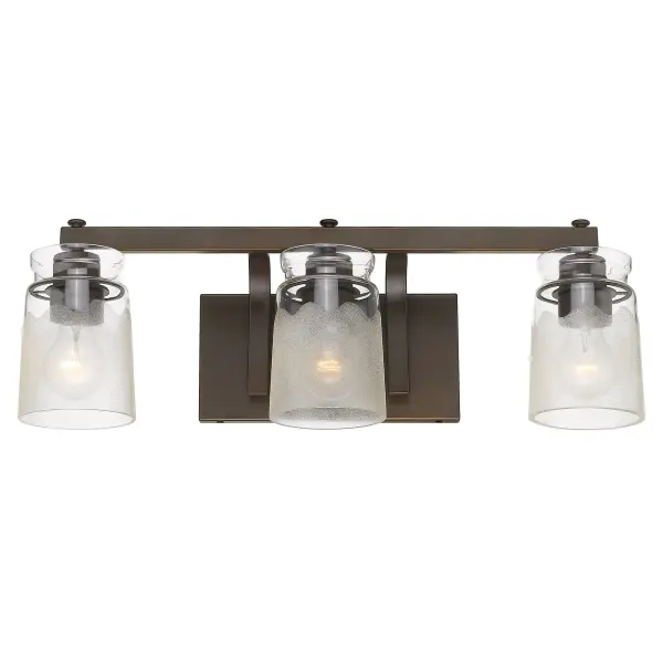 The Travers 3-light vanity combines timeless elegance with functional design. Its handcrafted clear frosted glass shades create a soft, diffused glow while the rubbed bronze finish adds classic warmth with subtle highlights. - alternate view