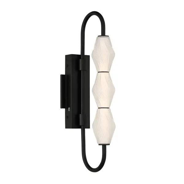 The Golden Lighting Geode 21.5" Integrated LED Outdoor Wall Light brings modern elegance and sculptural interest to exterior spaces with its vertically stacked fluted striped glass shades and clean architectural form. Finished in Matte Black, the steel frame offers a deep, non-reflective surface that enhances the fixture's sleek silhouette while providing timeless contrast against a variety of exterior finishes. The elongated fluted glass diffuses light softly, creating a welcoming glow that enhances safety and curb appeal. Measuring 8.39"W x 21.5"H x 4.72"D, this outdoor wall fixture is perfectly scaled for entryways, patios, and garage doors. Wet-location rated for direct exposure to rain and weather, it features integrated, energy-efficient LED technology delivering 864 lumens of illumination. The built-in 3CCT selector allows you to choose between 3000K, 4000K, or 5000K color temperatures, offering customizable light output to suit any outdoor setting. Collection: Geode Finish: Matte Black Glass: Fluted Striped Glass Width: 4.75" Height: 21.50" Weight: 3.96 lb Extension from Wall: 8.38" Canopy: 10.25"W x 1.63"H x 4.75"D Bulbs Included Number of Bulbs: 3 Maximum Wattage: 13.00 W Bulb Type: Panel Light Source: LED Dimmable Voltage: 120.00 V Country of Origin: China Safety Listing: ETL LED Manufacturer Warranty: 5 Year Limited