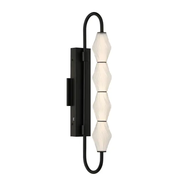 The Golden Lighting Geode 27" Integrated LED Outdoor Wall Light delivers bold vertical presence and refined modern style for exterior spaces. Designed with vertically stacked fluted striped glass shades and a clean-lined Matte Black steel frame, this fixture creates a striking architectural statement while diffusing light softly for a welcoming glow. The elongated form enhances curb appeal and provides functional illumination for entryways, patios, and garage doors. Measuring 8.39"W x 27"H x 4.72"D, this outdoor wall light is wet-location rated to withstand rain, snow, and direct exposure to the elements. Integrated LED technology produces 1079 lumens of bright, energy-efficient illumination, while the built-in 3CCT selector allows you to choose between 3000K, 4000K, or 5000K color temperatures to suit your exterior environment. Collection: Geode Finish: Matte Black Glass: Fluted Striped Glass Width: 4.75" Height: 27.00" Weight: 5.72 lb Extension from Wall: 8.38" Canopy: 15"W x 1.63"H x 4.75"D Bulbs Included Number of Bulbs: 4 Maximum Wattage: 17.00 W Bulb Type: Panel Light Source: LED Dimmable Voltage: 120.00 V Country of Origin: China Safety Listing: ETL LED Manufacturer Warranty: 5 Year Limited