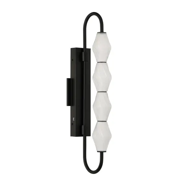 The Golden Lighting Geode 27" Integrated LED Outdoor Wall Light delivers bold vertical presence and refined modern style for exterior spaces. Designed with vertically stacked fluted striped glass shades and a clean-lined Matte Black steel frame, this fixture creates a striking architectural statement while diffusing light softly for a welcoming glow. The elongated form enhances curb appeal and provides functional illumination for entryways, patios, and garage doors. Measuring 8.39"W x 27"H x 4.72"D, this outdoor wall light is wet-location rated to withstand rain, snow, and direct exposure to the elements. Integrated LED technology produces 1079 lumens of bright, energy-efficient illumination, while the built-in 3CCT selector allows you to choose between 3000K, 4000K, or 5000K color temperatures to suit your exterior environment. Collection: Geode Finish: Matte Black Glass: Fluted Striped Glass Width: 4.75" Height: 27.00" Weight: 5.72 lb Extension from Wall: 8.38" Canopy: 15"W x 1.63"H x 4.75"D Bulbs Included Number of Bulbs: 4 Maximum Wattage: 17.00 W Bulb Type: Panel Light Source: LED Dimmable Voltage: 120.00 V Country of Origin: China Safety Listing: ETL LED Manufacturer Warranty: 5 Year Limited - alternate view