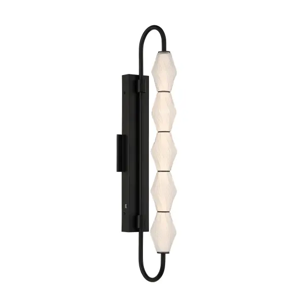 The Golden Lighting Geode 32" Integrated LED Outdoor Wall Light delivers dramatic scale and modern architectural style for exterior spaces. Designed with vertically stacked fluted striped glass shades and a clean, curved Matte Black steel frame, this fixture creates a commanding vertical statement while diffusing light into a soft, inviting glow. The deep Matte Black finish offers a smooth, non-reflective surface that enhances contrast and complements a wide range of exterior materials. Measuring 8.39"W x 31.73"H x 4.72"D, this tall outdoor wall light is ideal for entryways, patios, and garage doors where both style and visibility are important. Wet-location rated to withstand rain, snow, and direct exposure to the elements, it features integrated LED technology delivering 1514 lumens of bright, energy-efficient illumination. The built-in 3CCT selector allows easy adjustment between 3000K, 4000K, and 5000K color temperatures to suit functional or ambient lighting needs. Collection: Geode Finish: Matte Black Glass: Fluted Striped Glass Width: 4.75" Height: 31.75" Weight: 8.36 lb Extension from Wall: 8.38" Canopy: 19.75"W x 1.63"H x 4.75"D Bulbs Included Number of Bulbs: 5 Maximum Wattage: 22.00 W Bulb Type: Panel Light Source: LED Dimmable Voltage: 120.00 V Country of Origin: China Safety Listing: ETL LED Manufacturer Warranty: 5 Year Limited