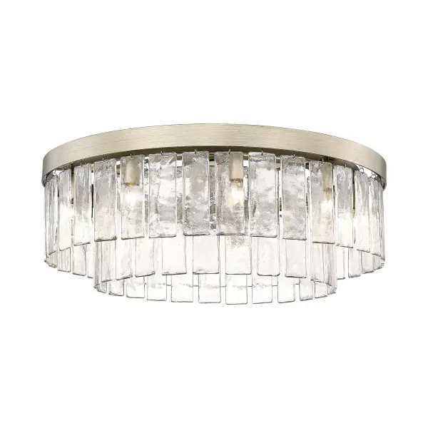 The Ciara 9-light semi-flush mount combines glamorous style with artisanal craftsmanship. Its unique White Gold finish blends warm and cool tones, while hammered water glass shades create sophisticated light refraction. Perfect for mid-height ceilings.