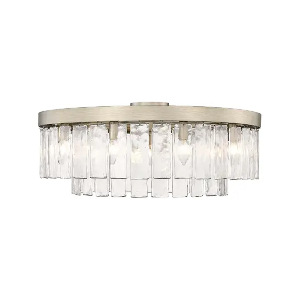 The Ciara 9-light semi-flush mount combines glamorous style with artisanal craftsmanship. Its unique White Gold finish blends warm and cool tones, while hammered water glass shades create sophisticated light refraction. Perfect for mid-height ceilings. - alternate view