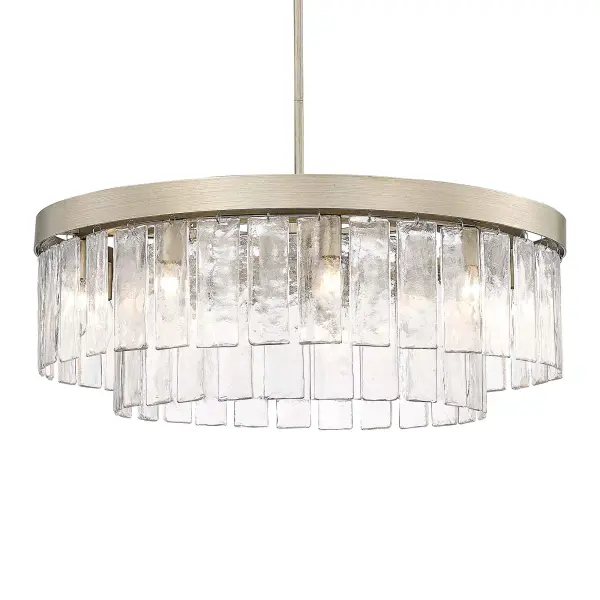 The Ciara 9-light chandelier combines glam elegance with transitional versatility. Its unique White Gold finish and hammered water glass shades create stunning light patterns while the convertible design offers flexible installation options.
