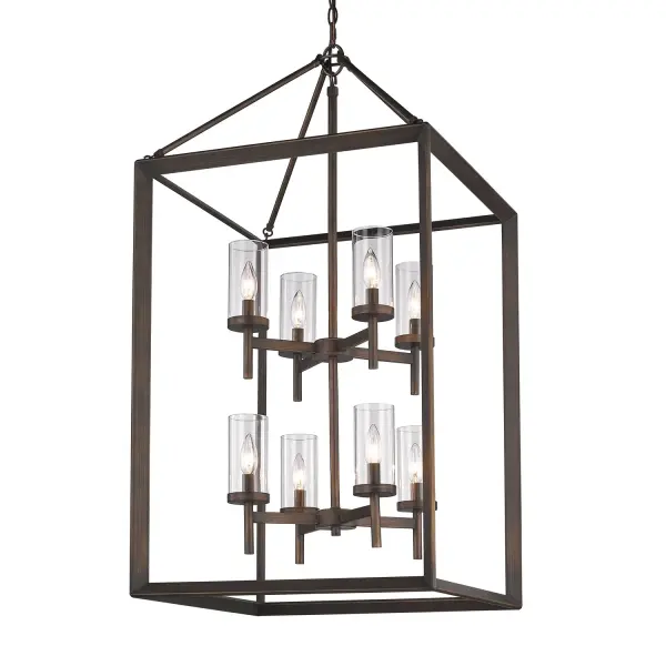 The Smyth 8-light pendant masterfully combines transitional elegance with industrial character. Its gunmetal bronze finish and clear glass shades create brilliant, unobstructed illumination while adding sophisticated depth to any space.