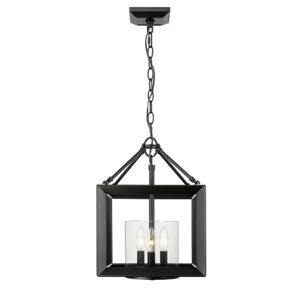 The Smyth 3-Light Chandelier combines timeless elegance with modern versatility. Its matte black finish and clear glass shades create a striking statement, while the convertible design allows installation as either a pendant or semi-flush mount. - alternate view