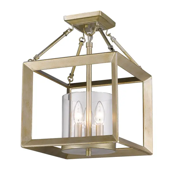 The Smyth 3-Light Chandelier combines transitional elegance with practical versatility. Its White Gold finish offers a unique blend of warmth with rustic brushed texture, while clear glass shades provide brilliant light. The convertible design allows installation as either a semi-flush mount or pendant.