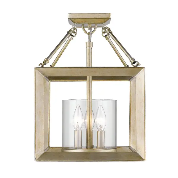 The Smyth 3-Light Chandelier combines transitional elegance with practical versatility. Its White Gold finish offers a unique blend of warmth with rustic brushed texture, while clear glass shades provide brilliant light. The convertible design allows installation as either a semi-flush mount or pendant. - alternate view