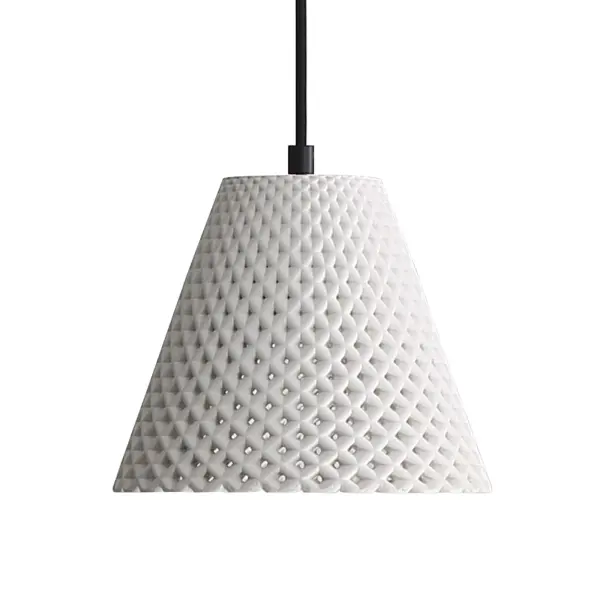 The Clarus pendant combines architectural minimalism with warm organic texture through its genuine cast cement shade. Integrated LED with 3CCT technology offers customizable lighting from warm to crisp white, while the compact 8" size makes it ideal for focused task lighting or clustered installations.
