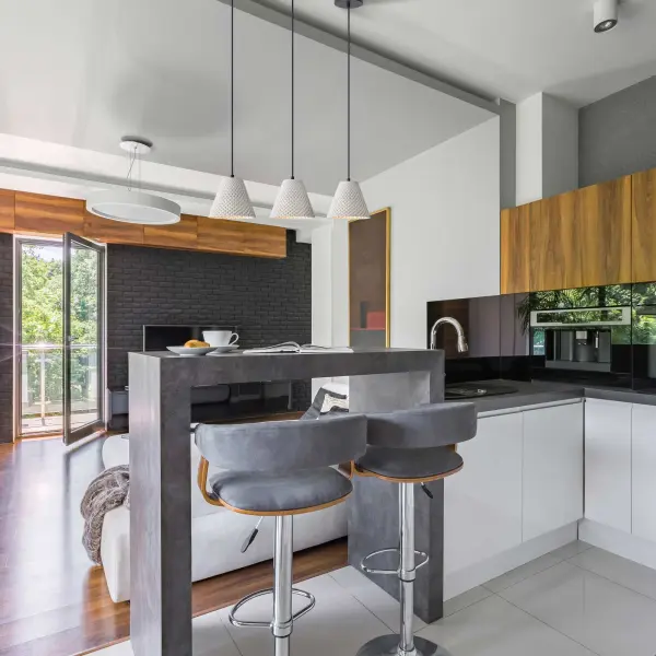 The Clarus pendant combines architectural minimalism with warm organic texture through its genuine cast cement shade. Integrated LED with 3CCT technology offers customizable lighting from warm to crisp white, while the compact 8" size makes it ideal for focused task lighting or clustered installations. - alternate view