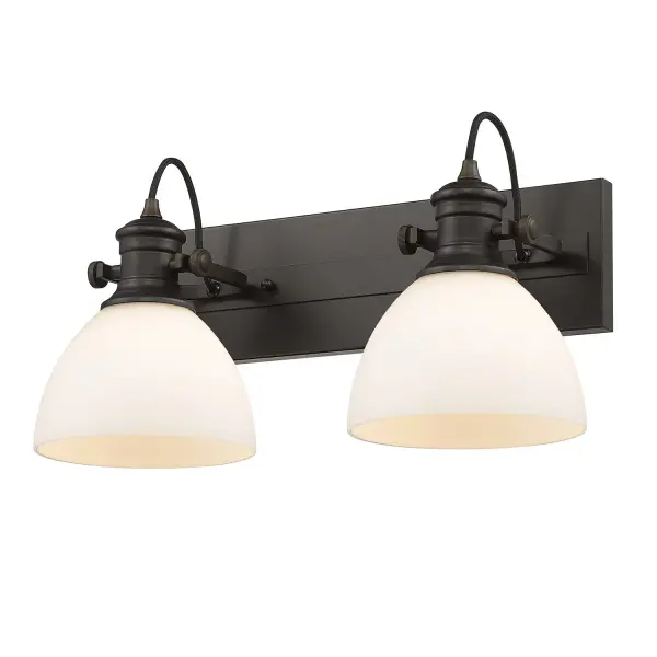The Hines 2-Light Vanity combines farmhouse charm with practical functionality. Its Rubbed Bronze finish and Opal Glass shades create a warm, inviting glow perfect for bathroom spaces. Adjustable directional heads offer versatile lighting options. - alternate view