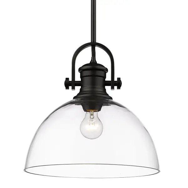 The Hines pendant combines traditional elegance with modern farmhouse charm. Its clear glass shade showcases the bulb beautifully while the matte black frame adds understated sophistication to any space.