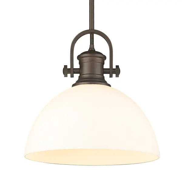 The Hines pendant combines farmhouse elegance with versatile functionality. Its opal glass shade provides soft, diffused lighting while the rich Rubbed Bronze finish adds warmth to any space.