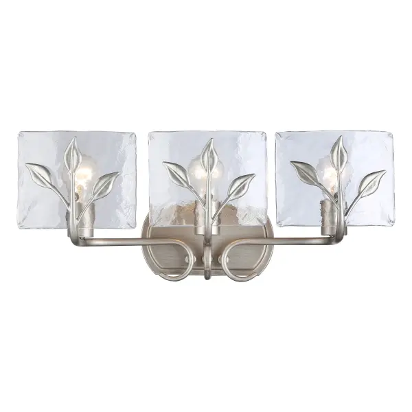 The Calla 3-Light Vanity combines rustic charm with practical illumination. Its hammered water glass shades refract light beautifully while the Peruvian Silver finish adds handcrafted character to any bathroom space.