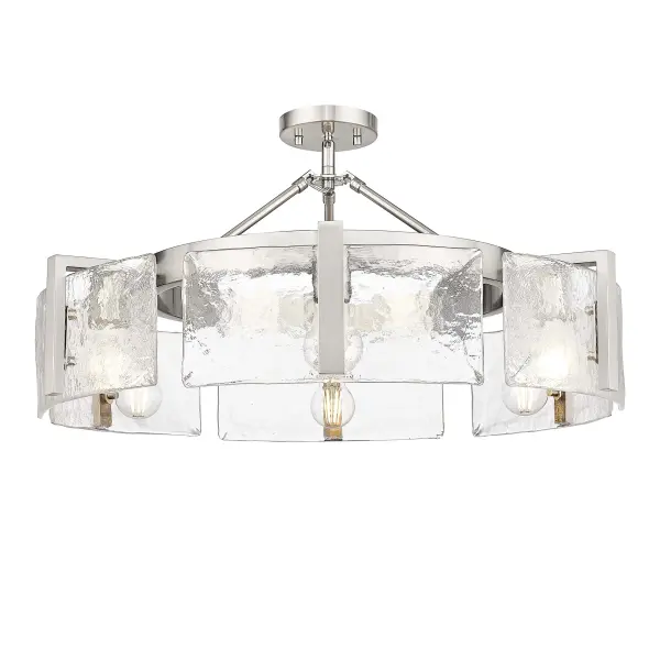 The Aenon semi-flush mount combines artistry with functionality through its hammered water glass shade that creates a beautifully distorted light effect. The soft pewter finish offers a sophisticated alternative to bright silver tones.