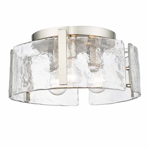 The Aenon flush mount brings organic sophistication to compact spaces with its hammered water glass shade that beautifully refracts light. The soft pewter finish offers timeless elegance while the low-profile design suits rooms with limited ceiling height.