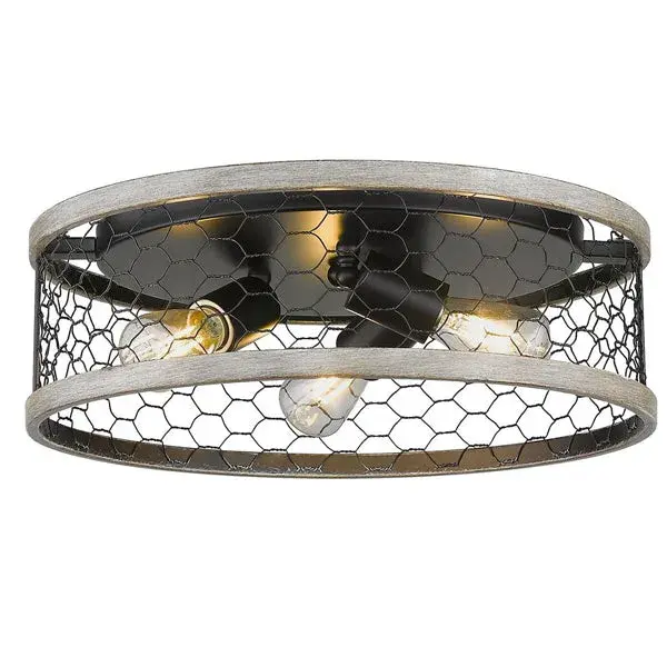 The Bailey flush mount combines farmhouse warmth with industrial edge through its distinctive chicken wire shade and matte black finish. Perfect for low ceilings, it delivers character and ambient lighting in compact spaces.
