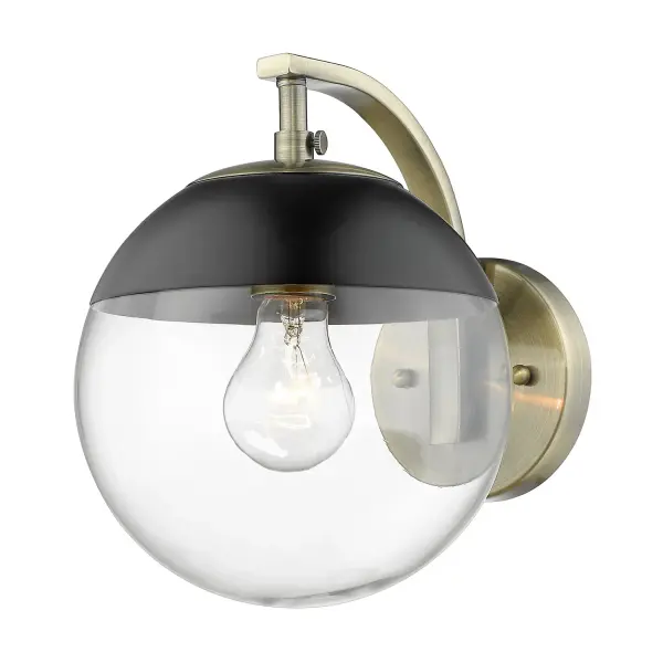 The Dixon wall sconce combines mid-century modern design with practical versatility. Its aged brass finish and clear glass shade deliver warm, unobstructed light perfect for intimate spaces. Damp-rated for bathrooms and covered areas.
