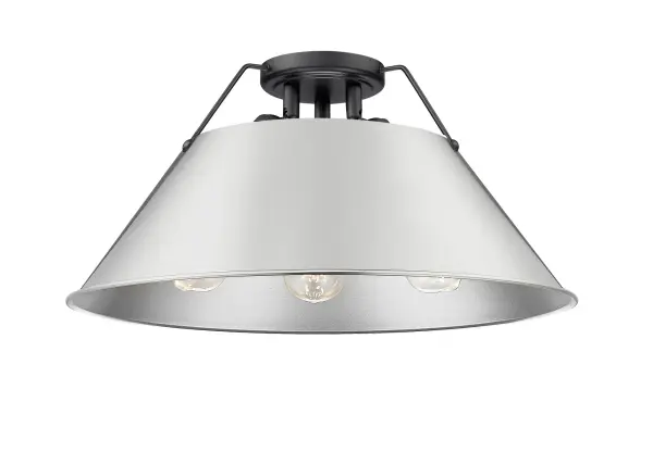 The Orwell 3-Light Flush Mount combines industrial style with practical functionality, perfect for low-ceiling areas. Its matte black frame and pewter shade create a sophisticated look while diffusing light beautifully.